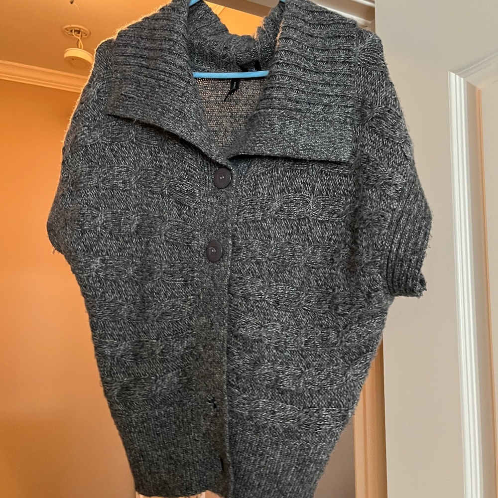 Grey sweater shirt sleeve